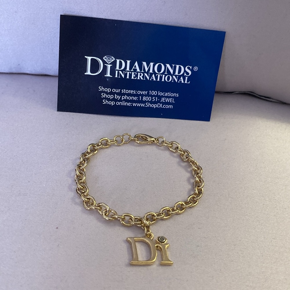 NWOT - Diamonds International Charm Bracelet & Di Hanging Diamond Charm